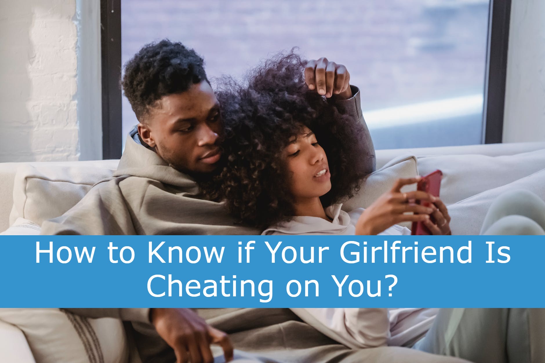 A couple is looking at the smartphone of a cheating girlfriend